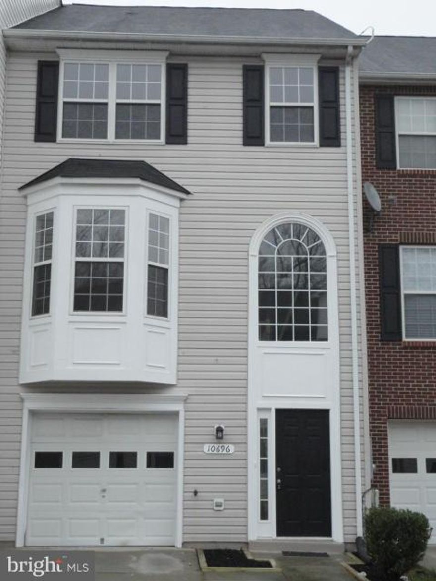 Gorgeous renovated town home.  Home features a gourmet kitchen w/42" cab, canter island, granite, SS; updated bathrooms; new carpet; new lighting, deck and more