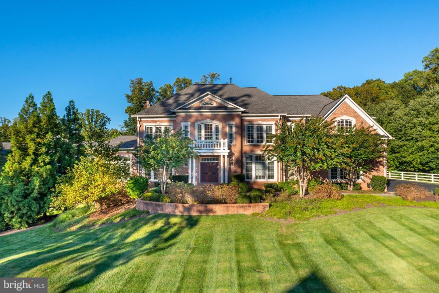 VACANT & MOVE-IN READY!! Stately brick colonial on almost 1 acre with two home offices, 5 bedrooms up,  picturesque landscaped backyard with patio and built-in grill. Luxurious details and amenities, this home boasts a magnificent 2- story Foyer, spacious formal Living and Dining Room, Chef's Kitchen with top of the line appliances opens to the Family Room that has a fireplace and oversized windows allowing for tons of sunlight. A dream Master Suite with fireplace, two walk-in closets and a spa bath.  Walk out Lower Level boasts two Bedrooms, Full Bath and large Recreation Room with fireplace. Spectacular property has oversized 4- car Garage & generator. Charles Owen Grounds pool plan available.