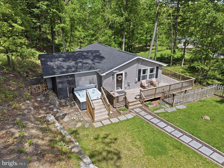 Welcome to this beautifully updated home in the sought-after Sleepy Hollow community! Situated on 1.47 acres, this 3-bedroom, 2-bath residence offers a spacious setting with modern upgrades throughout.
The open-concept floor plan is ideal for today’s lifestyle, featuring an eat-in kitchen with stainless steel appliances and seamless flow into the main living areas—perfect for everyday living and entertaining. The spacious primary suite includes a walk-in closet and a private en suite bath for added comfort.
Enjoy outdoor living on the expansive deck, complete with a hot tub. A newly paved circular driveway provides convenient entry and exit, while the front yard fence adds both functionality and definition to the outdoor space.
Recent 2023 updates include a new roof, HVAC system, windows, appliances, and deck. The home is also equipped with a salt water purification system with UV light, adding an extra level of water quality and peace of mind.
Residents of Sleepy Hollow enjoy access to community amenities, including a lake and beach, providing additional recreational opportunities.
Don’t miss this opportunity to own a beautifully updated home with space, modern improvements, and desirable community features. 
Schedule your showing today!