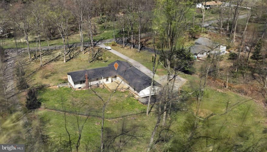 Open Sat 12-2pm  -- Mothers Day Special $5K Buyer Credit for an offer by 5/15/26 -- Spacious 4-Bedroom & Den, 3-full-bath, "Main Level living" residence with a FULLY finished walk out lower level  that  sits on a sprawling 1.31 acre lot, offering a perfect blend of contemporary luxury and serene country living. We invite you to come see this stunning modern transformation in gorgeous Howard County.  Some of the key features of this "like-new" home include:  Sophisticated Interior Finishes:-Kitchen features NEW granite countertops and NEW stainless steel appliances - Three  bathrooms with NEW fixtures, valves & hardware, including an owner's en-suite rain shower with a built in seat & heat lamp -  a NEW hall bath with a modern dual-sink granite top vanity. NEW toilet, NEW fixtures and a lower-level guest suite with a BRAND NEW full bathroom with oversized shower. Interior includes:- Bright, airy interior with over 44+ new LED recessed lights.
- A tasteful mix of NEW LVP flooring and  NEW plush bedroom carpeting
- A NEW high-efficiency mini-split system for year-round comfort in the Lower Level
- Fresh Paint, NEW Interior Doors, NEW Laundry Room and Mud Room with sink and Folding Area
Extensive Exterior Upgrades:  - NEW 30 yr. ROOF, NEW gutters with trim wrapped, NEW Downspouts and a NEW pressure treated wood rear 23 x 21 deck access off the dining area. NEW Side entrance cinderblock retaining wall, a private, fenced-in yard with nice landscaping with New Wood retaining wall in the driveway . - NEW Hot Water Heater, NEW Well Pump Filters - An expanded, side-loading 2-car garage with extra wide "workshop" area --* EXTRA SPACE for parking for an RV or additional toys ** Prime Location:  Situated within the highly sought-after Howard County School District feeding to Glen ELG HS -  providing rare privacy while remaining close to local amenities. House set back off the road. Easy Commute to Columbia, MoCo, Historical downtown Mt. Airy or anywhere off Route 70 !! GLEN ELG HS.