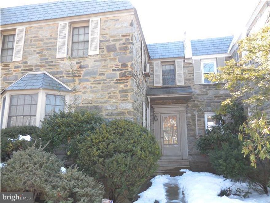 Sunny Stone 4 bedroom/2 bath townhouse with beautiful back views of the Bala Golf Course.  The first floor offers a spacious Living Room, Dining Room and Kitchen.  Charming archways, deep window sills, and a lovely bow window can be found.  On the second floor, there is a Master Bedroom with a decorative fireplace, two closets, and tiled bathroom with skylight.  There are three additional Bedrooms, a tiled hall bathroom, and linen closet.  The Basement offers laundry, cedar closet, utilities, and outside entrance leading to the 1 car attached garage.   Hardwood under carpets. Automatic Garage door opener found in basement.  Great Location! This home has so much potential, it just needs some updating