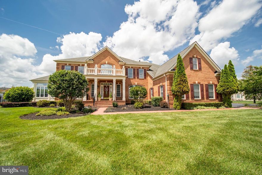 This elegant 3 level estate home aims to impress with many luxurious features.  This home was constructed by NV Homes, an award-winning builder.  It is close to shopping centers, bike trails and the Woodmore Country Club.  
Main Level: The NV Monticello  show stopping two story foyer w/double staircases; two hall closets for hanging coats; a formal living room & dining room, each with custom cornices; a sunroom/conservatory with tinted windows, suitable for your baby grand piano; a home office with double french doors and a built-in bookcase, large family room with a built-in mahogany alcove that spans an entire wall with a built-in gas fireplace, and space for a TV, located above the fireplace.  The eat in kitchen is spacious with granite counter tops and a ceramic backsplash that coordinates well with the counter and cabinets.  It has French doors that lead outside to a trex deck and gazebo.   A large kitchen island w/lots of storage space, butler’s enclave, built-in buffet, and a walk-in pantry are also assets of this home.  On one side of the kitchen is a morning room with 12 ft ceiling, 5 large palladium arched windows w/wood blinds providing serene views of the landscaped back yard and screened-in gazebo.  On the other side of the kitchen is a mud room that leads to the laundry room and a 3-car garage.  The mud room has a built-in bench and overhead cubicles for storing items.  There is also a customized closet in the mud room for shoes.  The first level of this home also has a ½ bath.
Upper Level:  The upper level has an Owners suite with double doors, a sitting room and spacious bedroom with tray ceiling and ceiling fan.  The Owners bathroom feels like a spa with its designer Spartan shower with dual shower heads, jetted whirlpool tub, his and her vanities and separate commode room with door.  The Owners suite also includes two walk-in closets.  One Master closet has a customized build out and expands over the entire 3-car garage.  There are three guest bedrooms on the upper level, each with its own full bathroom and walk-in closet.
Lower Level:  The lower level/basement is fully finished and embodies entertainment, relaxation, and recreation. There are two sides to the lower level.  On one side of the stairs that descend to this level from the main floor, is an area that has a fireplace and space for other furnishings. It is perfect for a man cave.  On the other side of the stairs is a wet bar with sink and small refrigerator and cabinets, and space for other furnishings, as well as a pool table.  This level also has a media room with a 107-inch theatre screen, that can seat 12+ chairs, depending on size.  There is so much space for so many things.  It has a finished bonus room that can be used for additional entertainment space or other options.  There is a 5th bedroom on this level that can be used as an exercise room or office space.  There is a full bathroom on this level, as well as three spacious storage rooms.
Exterior:  Front brick and aluminum siding on the sides and rear of the home.  It has premium landscaping, in the front and rear of the home.  The rear of the home has a black aluminum fence with 1 gate.  It has 14 station irrigation system, 3 zones for AC/Heating and a gas generator that automatically comes on when the power goes out.  There is a trex deck, with screened in gazebo attached.  The gazebo has an electrical outlet installed and a ceiling fan, as well as privacy shades.  The 3-car garage has custom built cabinets for outdoor supplies and equipment, as well as a butcher block worktop.  The home features a stamped concrete walkway to the front doorsteps and around the side porch near the garage.  Landscape lights set to a timer accent the front of the home at night, as well as the rear perimeter of the home.

More photos to come!