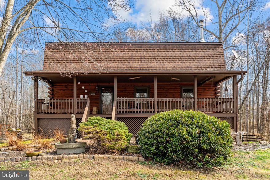 Dreaming of your new Homestead? Look no further! 

Low Energy Bill- Avg $158/month*2,973 sqft of Living Space*Lower Level Suite with Full Kitchen, Bath, Living Room, Bedroom and Private Walk Out Entrance!

Spring has Sprung!  Escape to the country and explore the trails and this enchanting Log Home!

Nestled in a serene rural setting, this beautifully renovated log home offers the perfect blend of rustic charm and modern comfort on 8.16 private acres with 2,973 square feet of living space. Major updates including new roof(s), freshly stained exterior logs on both the home and garage, fireplace lining, main level luxury bathroom with custom vanity, and other updates have transformed the home into a warm, inviting retreat featuring soaring two-story ceilings, exposed wood beams, and hardwood flooring.

The open living area flows into a kitchen with granite countertops and deck access—ideal for entertaining or enjoying peaceful country views. A main-level bedroom provides easy one-level living, while two additional bedrooms are located upstairs. The fully finished walkout lower level offers a private in-law suite with separate entrance, complete with a full kitchen, full bath, bedroom, and spacious living and dining area—perfect for guests or multi-generational living.

Outside, enjoy a full covered front porch overlooking neighboring open pasture, abundant wildlife, and scenic vistas, along with the soothing presence of a nearby creek. The level, partially cleared land includes a fully fenced flat acre ideal for animals, with access to walking paths, and riding trails. A detached oversized garage with large overhang provides ample storage or animal shelter.

Located on a no-thru street with a private driveway and abundant gardens, this property delivers true peace and quiet while remaining conveniently accessible to nearby amenities. This is more than a home—it’s a lifestyle defined by space, privacy, and timeless country living.