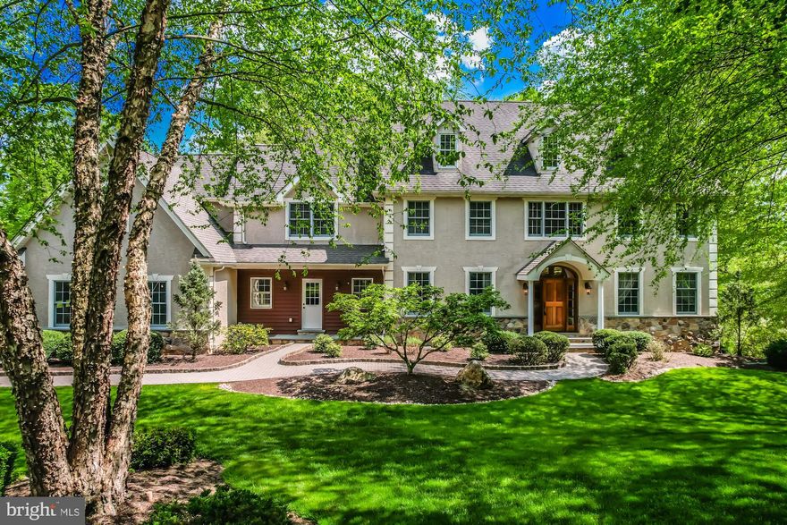 Welcome to this stunning 5-bedroom, 3 full baths,  3 car garage home, nestled in the serene neighborhood of Hamanassett @ Darlington on a cul-de-sac.  With meticulous craftsmanship and luxurious amenities, this home offers a blend of elegance and functionality. As you step inside, you're greeted by the 2 story entry,  formal living room with refinished hardwood floor, crown molding, marble surround gas fireplace plus dining room with triple crown molding & custom trim.  First floor has 9ft ceilings and 2 stair cases to 2nd floor plus  2 powder rooms. The family room with vaulted ceiling features new carpet and a 2nd gas fireplace with  floor to ceiling stone with mantle creating a cozy ambiance perfect for gatherings or quiet evenings. The kitchen features  42” cherry cabinets, quartz countertops, plus center island with a breakfast bar and butler's pantry with sink and glass front china cabinet. Hardwood floors flow seamlessly into the spacious breakfast area providing an inviting space for casual dining or entertaining guests plus sliding glass door to Azek (composite) Deck overlooking  mature woods. First Floor office has ample space for working at home or use it as versatile space to meet your needs. The covered breezeway entry leads to a tiled mudroom area with built in bench for storage, laundry facilities, pantry, and broom closet with a special feature of a laundry chute, ensuring functionality and organization for everyday living.  Retreat to the master bedroom suite, complete with a tray ceiling,  generous walk-in closet, and a luxurious master bath featuring a whirlpool tub, separate tiled stall shower, and double vanity sink also features a large sitting room/dressing room.  An additional on-suite bedroom offers privacy and convenience for guests or family members for a total of 5 bedrooms.  Other notable features include 2”x6” outside walls, architectural Roof 50-year shingle,  solid mahogany front entry door, epoxy garage floor.  The daylight basement provides potential additional living space and natural  light with high ceilings,  4 additional windows, French door to the rear patio.  Property has underground irrigation system to keep the lawn & landscaping looking good. Car collectors - the 3-car garage is ready for your car lift, with 11 ½ foot ceilings, 220v power, and high-lift garage doors in two of three bays.   Prime Location: Located in the award-winning Garnett Valley School District and offering easy access to Philadelphia & Wilmington with major routes such as RT 1, Rt 202 & Rt 95 which provides convenience and connectivity. Just minutes away from the bustling borough of Media, where you can explore theaters, restaurants, shopping, and community activities.  Wawa Train Station less than a 5-minute drive away and Philadelphia Airport within 25 minutes.  Voted by Money Magazine as one of the best places to live!  With attention to detail at every turn, this home offers the perfect blend of luxury and comfort. Don't miss the opportunity to make it yours!