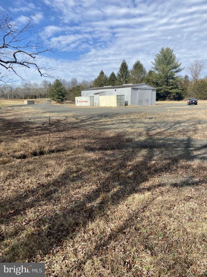 Clevenger's Corner Commercial Industrial Use/Zoned I1, lot w/ 1800 sq ft  metal building on 4.6 acres off of 211. Do not access the lot without the listing agent present!  Showings are by appointment only. Please no drive-bys. Well/water, abandoned septic, and a new conventional septic and drain field have been approved, shed and sea crates do not convey.  There is an approved  site plan for a RV parking and storage lot.  The property manager is retiring and the company is not going to develop the storage lot now.  Please call the listing agent with any and all questions. Should you have a Realtor, please speak directly with them and they will contact the listing agent. Several forms are attached to the listing for your Realtor to have access to.