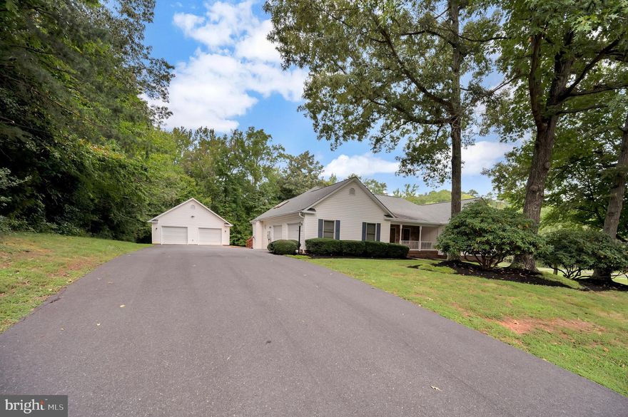 Outstanding Ranch/Rambler, located in sought after Courthouse Commons, this home boasts over 4,000 sqft.  of living space. Corner lot, 9/10ths of an acre! Main level features, huge kitchen with new granite counters, gas cooking, spacious family room, with vaulted ceilings, skylights, half bath, and gas fireplace! Home offers Formal Living and Dining rooms, Ample Primary suite with jacuzzi tub and separate shower, two additional bedrooms, and full bath round out the main level! The lower level is a home onto itself, it offers a complete 2nd kitchen, with table space, two additional bedrooms, and full bath, also features a office space, and its own private entry and driveway! The exterior features a covered front porch and large rear deck to enjoy those family get togethers! Last but not least, a 2-car attached sideload garage, and a 2-car detached heated garage! It awaits its new owners, PLEASE REMOVE SHOES, New carpet, thank you