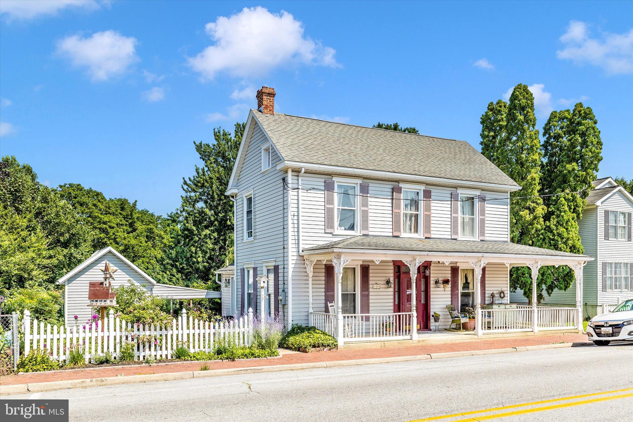 Come own a piece of history! This classic Victorian home used to be the schoolhouse for Smithsburg! Built in 1919, this home has all the historic charm with all the modern upgrades! Situated on a double lot and half an acre, this beauty features tall ceilings, with nice size bedrooms, a wraparound porch, open kitchen with custom island, updated baths, a beautiful stone gas fireplace, and a pool! This home just had the AC unit replaced in 2024! You won't want to miss the gorgeous primary bath that was just added this year! The backyard features a covered rear porch with an enclosed pool house that features the original stone hearth perfect for a relaxing evening or private sanctuary . The beautiful landscaping boarders the side yard and pool with a huge wrap around deck perfect for summer fun! This home backs to the walking trail and veterans park and is within walking distance to schools making it the perfect location! Schedule your private tour today!