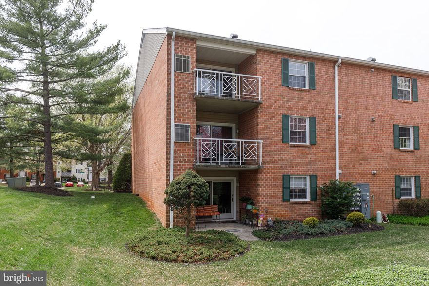 Welcome to the desirable  Mays Chapel area, a rarely available stunning ground floor back unit for privacy.  From your living room just a few steps to your patio. Beautifully landscaped & green space.  An open kitchen to the large living room with the above view. A separate dining room for entertaining ( currently a real office).  The kitchen has black appliances, granite countertops, and ample cabinet space, including a pantry.
The hall bath has a jacuzzi tub for relaxing. Both bathrooms have been updated. The primary bath has a beautiful bowl. The laundry room off of the kitchen also offers storage. 
What are you waiting for?