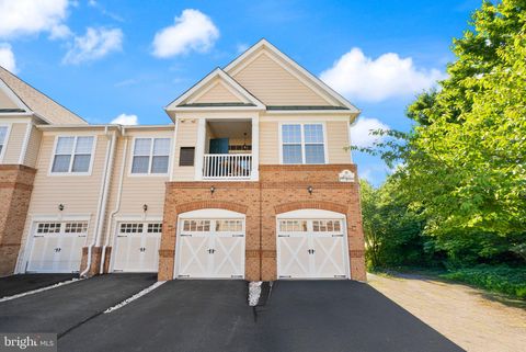 Photo of 43920 Hickory Corner Terrace #114, ASHBURN, VA 20147 (MLS # VALO2129808)
