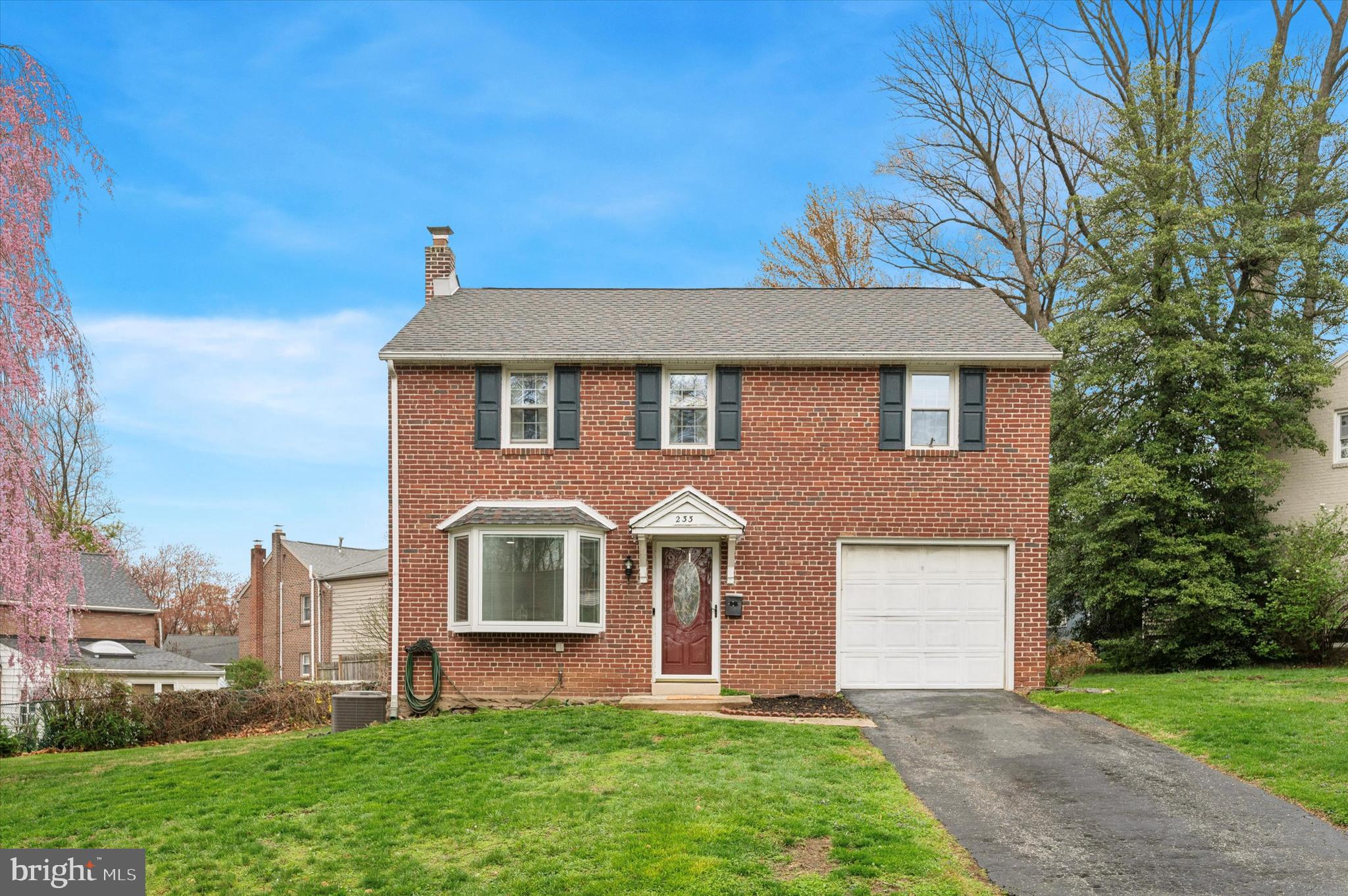 This classic 3-bedroom, 1-bathroom brick colonial is nestled in the sought-after Pilgrim Gardens neighborhood of Haverford Township (don’t let the zip code fool you)! This well-maintained home perfectly blends timeless character with modern convenience, offering a warm and inviting atmosphere from the moment you arrive.
Step inside to find a spacious living room with gleaming new hardwood floors and abundant natural light courtesy of the new windows, leading seamlessly into the dining room which is open to the updated kitchen for easy entertaining. The kitchen features ample cabinetry and granite countertops. A bonus room off the kitchen affords convenient first floor space for a playroom, den or home office. From here sliding doors grant access to the new paver patio and backyard, perfect for outdoor relaxation and summer barbecues. Back inside the kitchen there’s a door which opens to a great space for a pantry, a potential half bath or laundry room that also provides interior access to the storage garage.
Upstairs, you'll find three generously sized bedrooms with ample closet space and a full hall bath. Pull down attic stairs provide additional storage options. The unfinished basement provides plenty of storage and potential for additional living space. Laundry facilities are found here including a new dryer.
Located in a quiet, tree-lined community, with sidewalks this home is just minutes from shopping, dining, including the local favorite spot, Tank and Libby’s, fields, parks, trails & the Aronimink Swim club. With easy access to major highways and public transportation this home provides so much. Don't miss this fantastic opportunity to own a beautiful home in one of Drexel Hill’s most desirable neighborhoods!
