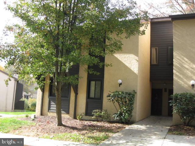 Well maintained FIRST FLOOR UNIT (no steps) with wooded views. This unit features 2 Bedrooms, 2 Full Bath, Full Kitchen with Laundry, Dining Room and Living Room. The spacious Living Room offers a propane gas fireplace and sliders out to small concrete patio. This unit also includes a storage unit in the basement area which is rare in this development. Assocation pays heating fuel plus water. Owner pays electric, cable and sewer. The Assocation has put a "hold" on use of the fireplace until further investigation and notice for all units. The Monthly Assocation Fee will have a 3% increase effective January 1, 2024. Owner may have 1 dog up to 30 lbs.