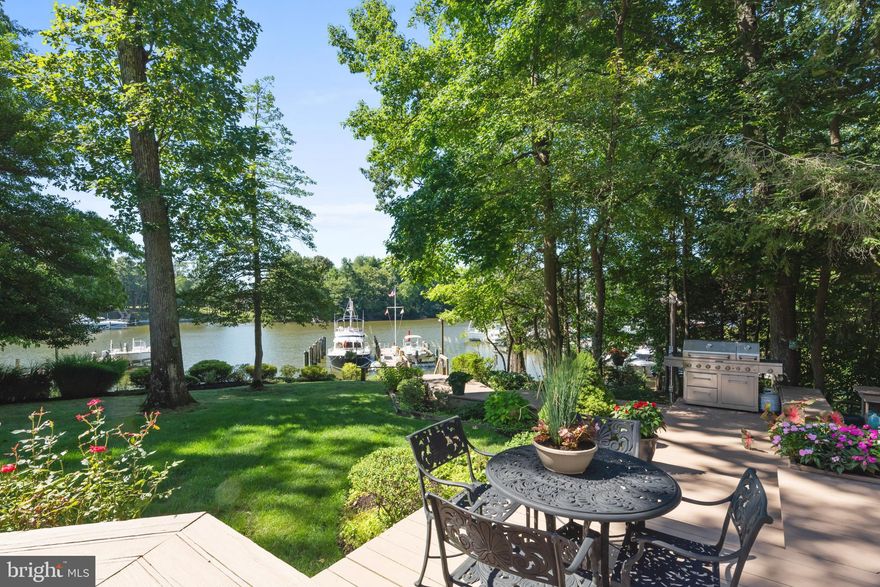 Incredible waterfront and water views on protected Ridout Creek in the coveted community of Amberley located minutes from the Chesapeake Bay.  Walk out the back door to the spacious deck and mature landscaping and in just a few steps you can walk to the  oversized deep water pier (6.5 ft MLW) that will accommodate up to a 55 foot x 20 ft boat and another slip with a 12,000 lb lift. This property has a Southern exposure, is  elevated and sits on .71 acres.   Fabulous indoor and outdoor entertaining space with spacious decking, fire pit and hot tub.  This ranch has been extremely well maintained, has 3 Bedrooms, two offices (that could be used as bedrooms) and an attached 3 car garage.  One garage bay has been converted to a professional workshop but can easily be converted back to a garage. Main level with open floor plan has waterside primary bedroom suite, a guest suite, office, family room, living room, updated kitchen with hardwood floors, two sided fireplace and cathedral ceilings. Finished lower level with recreation room with brick fireplace, bedroom, full bath, exercise room, office and wine storage. Roof replaced in in 2021, Generator, 2 zone HVAC. Located adjacent to Pier 3 in the community allows for overflow parking.

Interior photos coming soon!