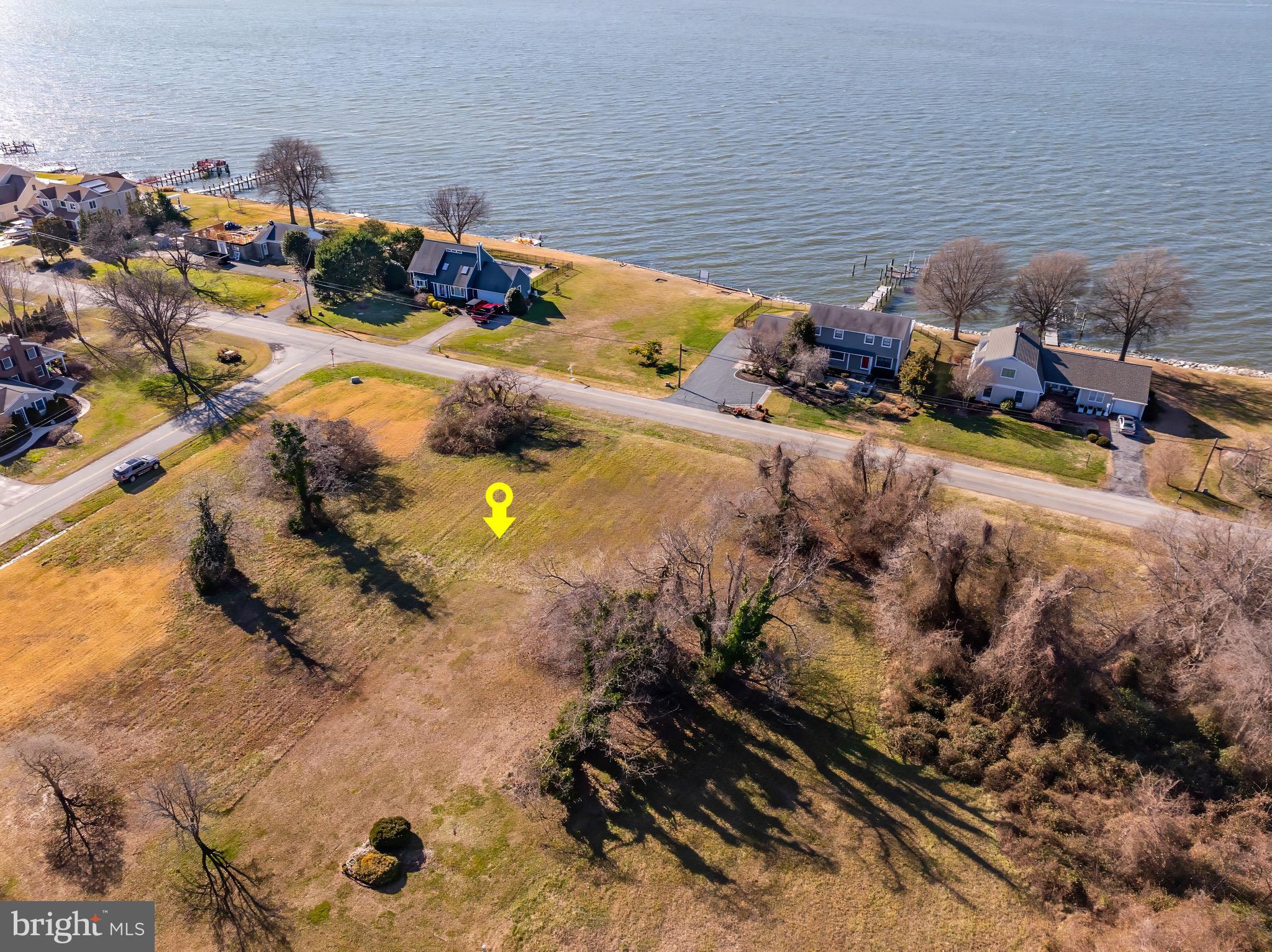 Incredible opportunity to own property on Kent Island with awesome views of the Chesapeake Bay. This almost half acre lot sits directly across the street from the waterfront and you can see the ships headed to their destinations. Community offers a 5 + acre park with fields, grilling and Pavillion, a Canoe launch on Price Creek and a Community Area directly on the Chesapeake Bay ! There is also a Marina and Golf Course ajoinging the community. Sewer Hookup should be available in 2024. Check skisewer.com for info.