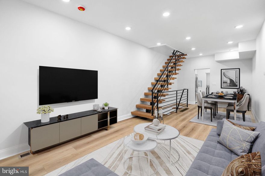 Stunning 3 bedroom, 2 full and one and a half bathroom townhome now available. Upon arrival, you'll notice a well kept block and ample street parking on the exterior. From there, a free flowing open concept boasting all natural light, half bathroom, laundry, modern kitchen, dining and living room combination on the main level. Next, 3 bedrooms, full bathroom and tons of closet space upstairs. And finally a finished basement with a full bathroom and spacious fenced in rear patio perfect for entertaining friends and family! Could it get any better though? It does! This home also has a new roof, hot water heater, electric, plumbing, windows, flooring and appliances throughout. In addition, it's near all the public transportation you need to make the commute a breeze so make your appointment today before it's too late!