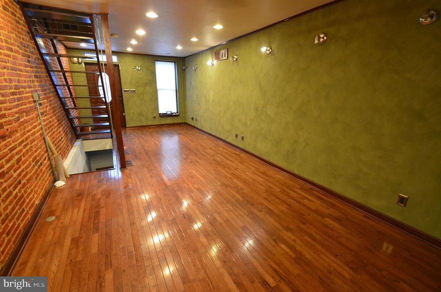 Fabulously Located Canton Rental with PARKING!! Hardwood floors, full Basement, Gourmet Kitchen, Tons of light, Exposed Brick, Elaborate Master Bathroom with walk in closet. Across the street from Rite Aid; Steps from the Wine Bar/ Restaurant Gitan; 4 blocks from the bars/ restaurants of Canton Square, 4 blocks from Safeway, Starbucks, and other small establishments.