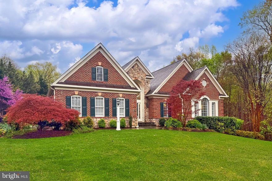 Come visit the wonderful community of the Reserve at Hunter's Ridge with large private lots full of mature trees and lots of wild life.  This custom built brick and stone ranch was built by Quaker Custom Homes with the pool and outside living features designed and built by Town and Country Pools.  This home is unique to the community with all 3212 square feet on one living level.  This main level living space includes 3 bedrooms, each with its own private bath, an office with decorative built-ins, a very large dining room, an eat-in kitchen with a breakfast bar and breakfast table area and an adjoining Family Room with gas fireplace.  There is also a sunroom which lead directly out to the concrete and stone patio overlooking the private pool, pergola and expansive concrete decking.  Between the kitchen and the 3-car, end load garage is a large pantry as well as a mud room/laundry room with separate entrance.  As a bonus, most of the walkout basement has been finished.  There is approximately 2000 finished square feet of living space which consists of a large bedroom with a walk-in closet and semi-private luxury bath, a bonus room, a walk-out rec room (with full sized windows providing plenty of natural lighting) for all of the many purposes you can find for the space, a kitchenette with microwave, beverage refrigerator and a sink, and more than 1200 square feet of storage space, because you just cannot have enough.  Well, this may be enough!!  Some of the dramatic features that enhance the appeal of all of this space are: 9' ceilings, 12' ceilings, double tray ceilings, custom tray ceilings, custom casings, wood floors, crown moldings, chair rail moldings, shadow boxes and so much more!!  Come see this home for yourself.  You will love it!!