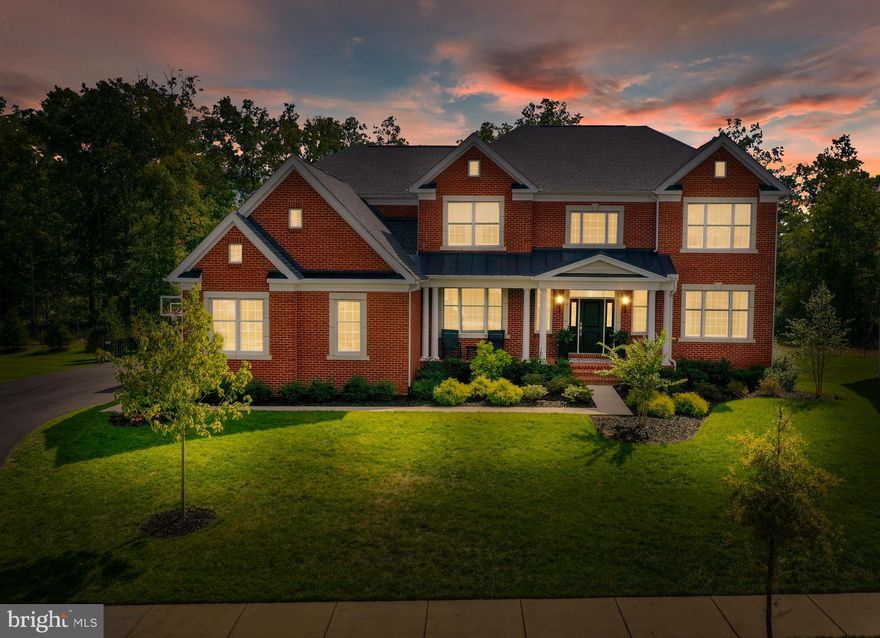 *Stunning Harding Estate Situated on .36 Acre Lot Backing to Conservation Tree Save Area*Nearly 6700 Finished SQFT*Premium Cul de Sac Lot*Located in Award Winning Gated Golf Community with Resort Style Amenities including Newly Renovated Clubhouse*Perfect Home for Entertaining Inside or Outdoors*3 Car Side Load Garage with Extended Driveway*Charming Brick Front Porch*Dramatic Two Story Foyer with Elegant Oak Dual Staircase*Formal Living Room has been Converted to a Second Home Office with French Doors*Formal Dining Room Showcases Elegant Crown and Shadowbox Molding, Triple Window and Two Chandeliers*Well Appointed Palladian Kitchen includes an Eat In Breakfast Area and Naples Sunroom Addition*Classic White Cabinets, Pot and Pan Drawers, GE CafÃ© Professional Series Stainless Steel Appliances, 6 Burner Gas Cooktop with Vent Hood, Quartz Countertops, French-Door Convection Wall Oven, Built-In Microwave, Herringbone Tile Backsplash, Under Cabinet Lighting, Desk Area, Extended Center Island with Vegetable Sink and Pendant Lights*Custom Prep Kitchen with Butcher Block Counter and Pot Filler*Premium Wide Plank Engineered Hardwood Floors Throughout Main Level and Upper Level Landing*Decorative Paint Throughout*Updated Light Fixtures and Custom Window Treatments*Audio Buys Speaker System*Trex Deck accessible off Kitchen and Sunroom*Expanded Family Room includes a Cozy Gas Fireplace, Crown and Shadow Box Molding, Chandelier and Secondary Staircase*Private Study with French Doors, Built Ins and Crown Molding*Mud Room with Built-In Cubbies (Drop Zone) and Board And Batten Accent Wall*Laundry Room Located on the Bedroom Level includes Conveying Washer and Dryer*Retreat to the Primary Bedroom Suite Featuring a Tray Ceiling, Sitting Room, and Two Large Walk-In Closets with Custom Closet Organizer*Spa like Primary Bath includes a Tray Ceiling, 6â Soaking Tub, Spa Shower with Bench Seat, Double Vanities with Quartz, Linen Closet and Private Water Closet*Princess Suite includes a Double Closet with Custom Closet Organizer and En Suite Full Bath*Guest Suite includes a Walk-In Closet, Linen Closet, and Full Bathroom*Spacious Bedrooms 4 and 5 with Double Closet and Ceiling Fan Share a Jack & Jill Bathroom*Finished Basement with 9 FT Ceilings, Open Recreation Area and Wet Bar with Leathered Granite Countertop, Full Bathroom, Stain Resistant Neutral Carpet, and Large Storage Room*Outdoor Living Includes Trex Deck, Paver Patio with Wood Burning Fireplace and Hearth, Seat Wall, and Newly Installed $22k Hot Springs Grande Salt Water Hot Tub*Fenced Rear Yard*Professionally Landscaped with Zoned Irrigation and Exterior Lighting Package*Painted Garage with Professionally Installed Opoxy Flooring*Excellent Schools Located Inside of Community*Minutes to Major Commuter Rts I-66, 29, 50, 15 and Upscale Shopping & Dining*DVCC Amenities Include: Renovated Clubhouse*Sports Pavilion*Exercise Room*4 Private Outdoor Pools*Indoor Pool*Pickleball and Tennis Courts*3 Basketball Courts*Sand Volleyball*Miles of Scenic Walking Trails*Multiple Tot Lots*2 Stocked Fishing Ponds*Trash & Snow Removal*Fitness and Full Golf Membership Available*