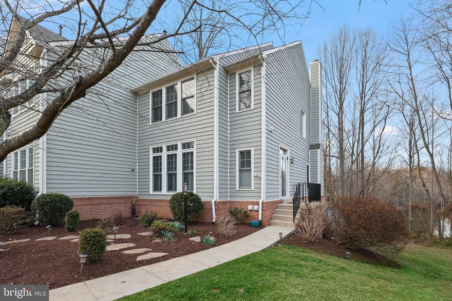 Welcome to rarely available, immaculate end-unit , Townhouse in Reston , with gorgeous pond views and backing to pond and woods!!  ***Recent updates-Fresh paint (2025), Brand New Plush carpets on Stairs and the second level (2025),New Hardwood Floors on the main level(2025),  Dishwasher (2025), updated master bathroom lighting (2025); New Washer Motor (2025), Dryer (2024); Storm Doors (2023), Five Windows (2023), Rain Gutters Replaced (2021) ,  Exterior Paint (2023)****Step inside an inviting open floor plan, where high-end hardwood flooring enhances the main level's modern appeal, complemented by cozy carpet on the upper and lower levels. The living room, with its stylish built-ins, entertainment area,  flows seamlessly into the open kitchen featuring granite counters, stainless steel appliances, a charming breakfast nook which is perfect to enjoy your morning tea /coffee meals while enjoying the pond views in the back and access to the  expansive deck backing to woods  & pond—perfect for outdoor dining and entertaining in complete privacy!!  Retreat to the generously sized primary bedroom, complete with an ensuite bathroom offering dual sinks and a spacious walk-in closet.  Additional bedrooms provide plenty of space for comfort and creativity. The lower level offers a versatile flex space with a welcoming fireplace, ideal for cozy gatherings and a home office /entertainment area! . . Step outside from the basement to enjoy the patio, overlooking the tranquil Bright Pond—a serene backdrop for relaxation. There’s a neighborhood playground 75 yards away .   Nestled in the sought-after Weatherstone Cluster of the Reston HOA, you'll enjoy a vibrant community atmosphere and access to exceptional amenities. Conveniently located near shopping, dining, Baron Cameron Park, and major commuter routes including 286 and Route 7, this home perfectly blends comfort, style, and convenience.