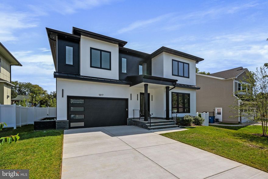 Welcome to 1817 Peabody Dr, a masterful blend of modern elegance and inviting comfort. This stunning 6-bedroom, 6.5-bathroom home spans just under 6,400 square feet of generous living space.

Upon entering, you're greeted by an abundance of natural light that pours through elongated windows, illuminating the white oak wood floors and wainscoting styled ceilings. The open-concept kitchen and family room provide the ideal setting for both casual and formal gatherings. The state-of-the-art kitchen comes complete with a spacious island, modern white cabinetry, and high-end Jenn Air appliances.

The first floor also features a spacious bedroom with a luxurious ensuite and walk-in closet. An office and powder room add convenience and functionality.

The second floor is a haven of comfort and luxury. The primary bedroom suite offers serene backyard views, a spacious custom walk-in closet, and a spa-like bath area with a freestanding bathtub, grand shower, and dual sink vanities. Additional bedrooms boast their own ensuite bathrooms and walk-in closets. The laundry room, equipped with ample built-in storage, ensures ultimate convenience.

The lower level uncovers a private oasis, complete with a stylish wet bar, a bedroom with an adjoining full bathroom, a media room for endless entertainment, and a gym to keep you in peak condition.

Step outside to the expansive covered stone patio, perfect for entertaining or simply unwinding by the fireplace.

This exquisite home is nestled in the desirable Pimmit Hills community, with easy access to major airports, routes 66 and 267, and a plethora of shopping and entertainment venues. 

Experience the ultimate blend of modern design, comfort, and convenience at 1817 Peabody Dr. Welcome home.
