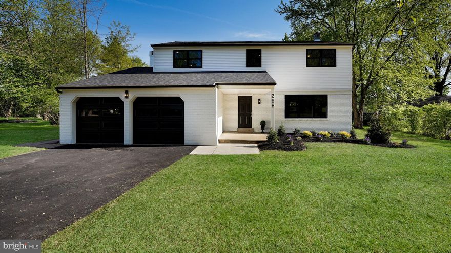 As you arrive, you’re immediately drawn to the striking black-and-white exterior of this beautifully updated Colonial, offering timeless curb appeal with a modern edge.
Step into the foyer, where you’ll find direct access to a spacious, light-filled living room, along with clear sightlines straight through to the stunning, fully renovated kitchen. Thoughtfully designed for both everyday living and entertaining, the kitchen features a long center island, custom finishes, and opens seamlessly to the dining area—creating an ideal gathering space.
At the rear of the home, the kitchen flows into a comfortable family room complete with a fireplace and dry bar area. Sliding doors lead to the back patio, extending your living space outdoors. This level also includes a convenient half bath, mudroom/laundry area, and direct access to the garage.
Upstairs, the oversized primary suite offers a private retreat with a walk-in closet and a beautifully updated en-suite bath featuring a double vanity and elegant stacked tile. Three additional generously sized bedrooms and a hall bath with a double sink and a tiled tub/shower complete the second floor.
The home also includes a full unfinished basement, offering excellent storage or future finishing potential.
Set on a spacious 0.88-acre lot, the backyard provides endless possibilities—whether you envision a pool, outdoor entertaining space, or simply room to relax and enjoy.