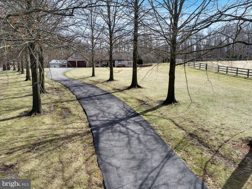 9.3 Acres of Pure Serenity and Privacy.  When you drive in the tree-lined paved driveway, you feel like home. There are 2 additional large pole buildings 46 x 78 with a heated shop and horse stalls and a 44 x 50 garage/polebarn. One of the barns has 4 stalls plus storage and the other is currently used for equipment storage. Numerous Run-in sheds. Fenced in pasture with runs.  Large rear patio with firepit and gazebo.  
The home has tons of space to entertain or spread out and relax.  Please give at least a 48 hour notice for showings. Thanks