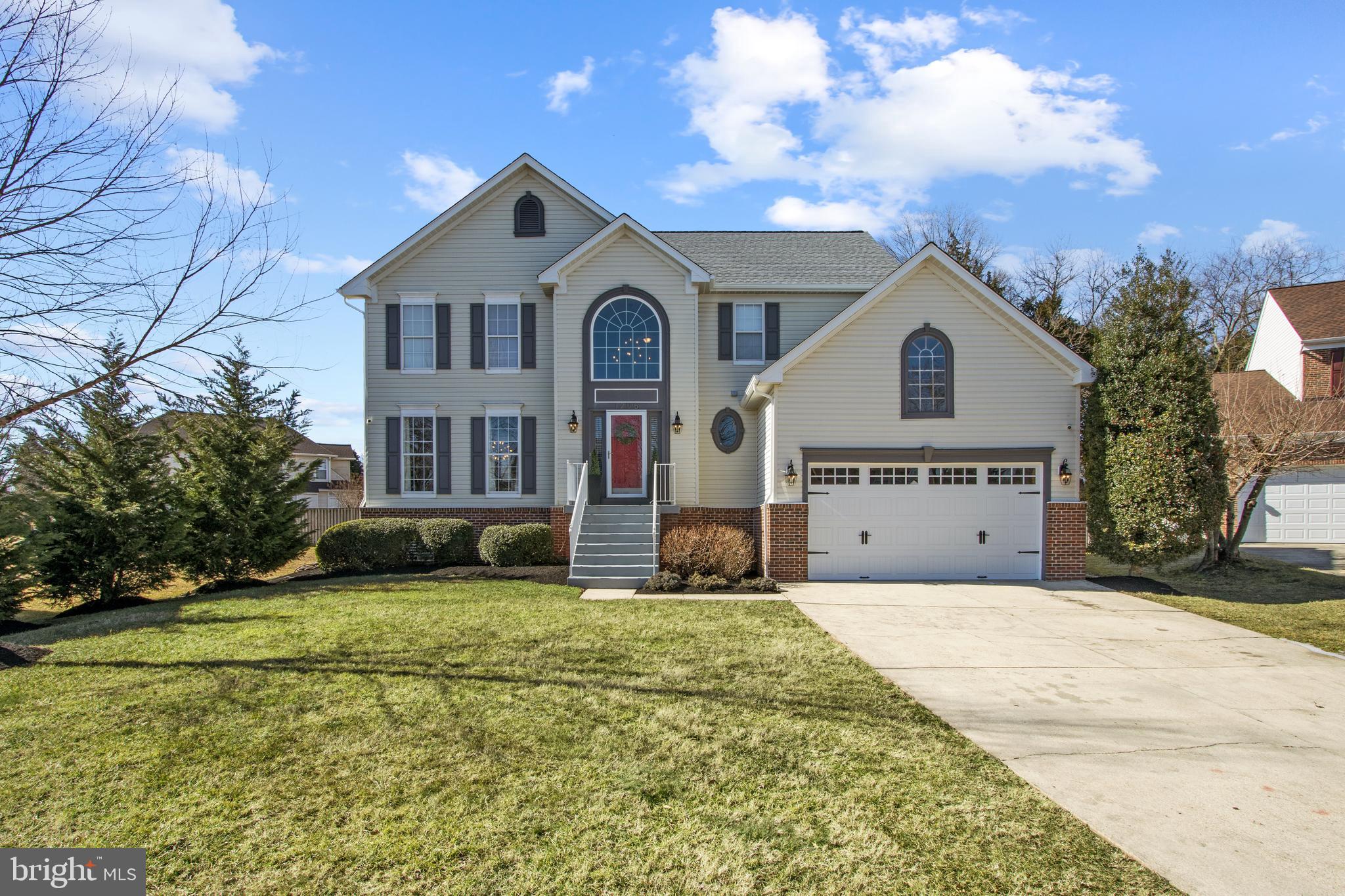 ***Offers Being Reviewed 2/28 at 7:00pm*** Meticulously well-kept Perrywood colonial. Quiet cul-de-sac with oversized two-car garage. This home has been renovated with designer touches and attention to detail. Soaring two-story foyer with large palladian window replaced in 2019. Dark rustic oak flooring throughout the main level. Living-room floor to ceiling windows and crown molding. The large chefs kitchen boasts quartz countertops, 5 burner professional range with convection oven, wine cooler, and deep double stainless-steel sink. The step-down family room boasts a gas fireplace and ample natural light. Upstairs, there are three secondary bedrooms with generous closet space. The bright owners suite boasts a separate sitting room, walk-in closet, and updated bathroom (2021). Hall bathroom updated in 2019 with designer double vanity and porcelain tile. The lower level is an entertainers dream! Exposed beamed ceiling, recessed lighting, family room, play area, theater room, additional storage, and laundry room creates the perfect family retreat. The updates dont stop there! Trane HVAC (furnace and condenser) with Nest thermostat replaced in 2017. Water Heater replaced in 2017. Roof replaced in 2020. Sump pump replaced in 2020. Gutters replaced in 2021. Garage door and Chamberlin opener with Bluetooth replaced in 2017. Main level back door purchased and will be replaced with new energy efficient slider by BGE in March. For more space, move outside to the fenced backyard where youll find a large deck and paver patio. When in bloom, large Boxelder trees and Evergreens allow for a private summer retreat. Don’t miss out on the opportunity to own this delightful home. Community tennis courts, pool, paths, and walk to Watkins Regional Park. Andrews AFB (11 Mi. ), Bolling AFB (19.5Mi. ), Pentagon (25 Mi. ), Navy Yard (20 Mi. ). *Square footage does not include finished basement. Whole house totals 3500 square feet* **Co-Owner Agent**