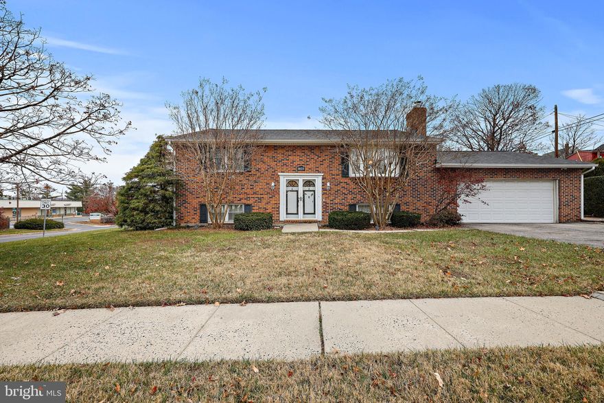 Welcome Home! Open and spacious split foyer on a large corner lot! Large kitchen with abundant counter space opens to a generous living room boasting large bay window.  Deck off the rear with steps to the patio. Garden beds on the side boast many perennial flowers and herbs, garlic and berries. Established asparagus plants, and plum trees. Finished lower level with family room and fourth bedroom. You won't want to miss this one!