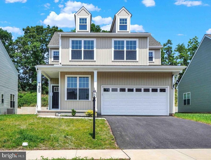 Opportunity to be the first owner in this brand new home! Step into a bright, open-concept layout designed for effortless entertaining. The upgraded kitchen boasts elegant granite countertops and seamlessly flows into the spacious family room, complete with soaring cathedral ceilings and a cozy gas fireplace. Enjoy the versatility of a formal dining room and a flex space—perfect for a home office or additional living area. The upper level includes A primary suite with a walk-in closet and luxurious en-suite bath. Two additional bedrooms, a guest bath, and convenient laundry area complete the upper level. Easy commute to I-83 and Rt. 30. Convenient to restaurants, shopping, and local amenities.