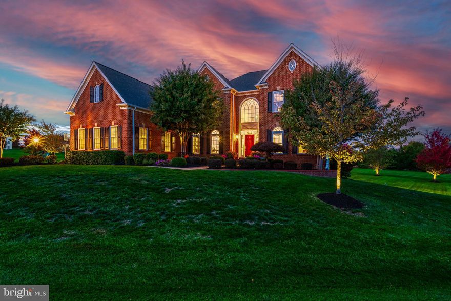 Nestled in a quiet cul-de-sac on a nearly one-acre lot that backs to a serene common area, this Clifton Park model epitomizes luxury living with its 7,000 square feet of meticulously finished space. Beyond its three-car, side-load garage and expansive driveway, this residence unveils a realm of sophistication and comfort.

Step into an environment designed for both grand entertaining and intimate gatherings, where a screened-in porch with a cozy fireplace and TV, coupled with a sprawling deck, offers seamless transitions to a vast patio for alfresco delights. The heart of the home is its breathtaking kitchen, featuring a monumental center island set beneath elegant pendant lighting, beautifully refinished cabinets, and a walk-in pantry for your culinary exploits. The adjoining morning room bathe the space in natural light, enhancing every moment.

The two-story great room, with its towering gas fireplace and immense atrium windows, serves as the centerpiece, offering spectacular views and a sense of grandeur. Convenience meets style in the built-in butler's pantry, designed for discreet small appliance storage. Formal living and dining rooms provide a refined backdrop for hosting, while a spacious laundry room with ample cabinets and a sink adds practical elegance.  Completing the main level, a spacious office is the perfect space for remote work.

Upstairs you'll find the primary suite beyond french doors.  A sanctuary of luxury, with a tray ceiling, a private sitting room, a spa-like bathroom, and an expansive walk-in closet.  The additional bedrooms on the upper level are all spacious and equipped with a private en-suite and walk in closet.

The finished walk-out basement is an entertainment haven featuring a wet bar with quartz countertops, an additional fireplace, a game room, den, guest bedroom, and full bathroom.

Situated in a community renowned for its exceptional schools and proximity to the metro station, this home is not just a residence but a lifestyle offering. Experience the pinnacle of luxury living in a home that leaves no detail to chance.  Many upgrades and renovations totaling over $200,000 in value, including a new roof in 2022!