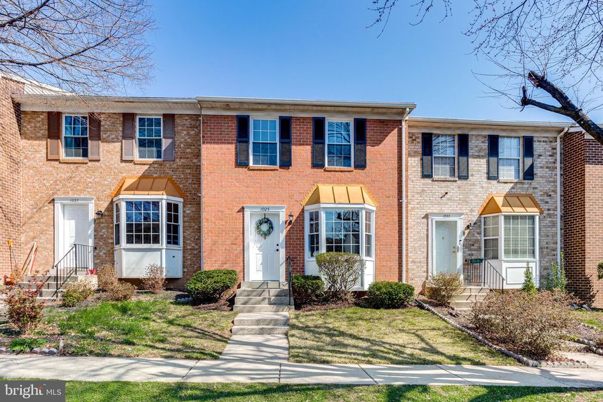 Highest and Best offer due by 5pm on Monday 4/5.  A completely remodeled brick front townhome in the Montgomery Meadow subdivision featuring 3 bedroom, 2 full bath and 2 half bath, fully remodeled kitchen with soft closing white shaker cabinets, sparkling white quartz countertop, island with sitting area, stainless steel appliances, all new beautifully renovated bathrooms, all new windows, new sliding door, hardwood floors on main level, new carpet, fresh paint throughout, fresh painted deck with fenced yard, walk out basement with new waterproof LVP flooring,  fireplace in family room, recessed lights throughout, HVAC (2017/2018), Water Heater (2019), Roof (2017/2018).  Two reserved parking spaces.  Community pool, tennis courts, tot lot.   Only few minutes from I-270, shopping centers, library, restaurants and the new Spectrum Town Center development.