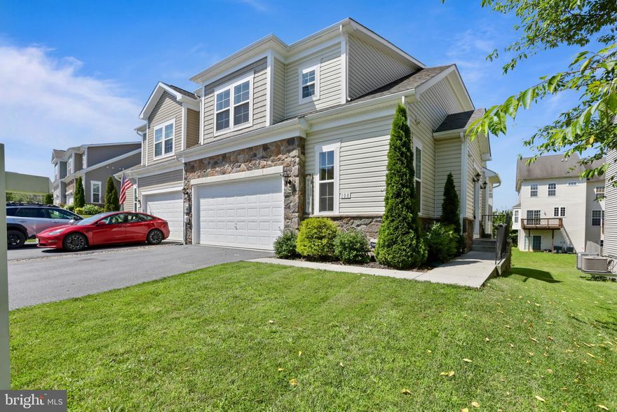 Welcome to 108 Strathmore Way E, a beautifully maintained three-bedroom, two-and-a-half-bath villa-style home offering over 2,200 square feet of thoughtfully designed living space for comfort and convenience. This home provides ample room for families or those who love to entertain, with a layout that maximizes both privacy and open living.

The open-concept main level features vaulted ceilings and beautiful wood floors that continue through the stairs and upper-level loft, enhancing the sense of space and light throughout the family room, dining area, and kitchen. The kitchen is appointed with quartz countertops, stainless steel appliances, ample cabinetry, and a center island with a breakfast bar perfect for casual dining. The main-level primary suite offers a peaceful retreat with a generous closet and en-suite bath. Additional conveniences include a main-level laundry area and a half bath for guests. Upstairs, a versatile loft overlooks the living space below and can serve as a home office, reading nook, or media area. Two additional bedrooms and a full bath complete the upper level, with ceiling fans in every bedroom providing added comfort.

The community offers a peaceful, sidewalk-lined environment with well-maintained landscaping and scenic views. Amenities include a clubhouse with a gathering room and catering kitchen, paved walking and biking trails, open green spaces, a gazebo, a playground, tennis courts, and a swimming pool. A stocked pond provides opportunities for fishing, adding to the range of outdoor activities available. Seasonal events and neighborhood gatherings help foster a strong sense of community and pride of ownership.

Conveniently located near a variety of shops, grocery stores, and restaurants, this home provides easy access to local conveniences and recreational areas such as parks, historic sites, wildlife areas, and trails. Excellent transportation options include nearby highways and a commuter rail station offering direct connections to surrounding metropolitan areas. Combining a well-designed floor plan, extensive community amenities, and excellent accessibility, 108 Strathmore Way E is an ideal choice for those seeking comfort, ease, and a welcoming neighborhood atmosphere.