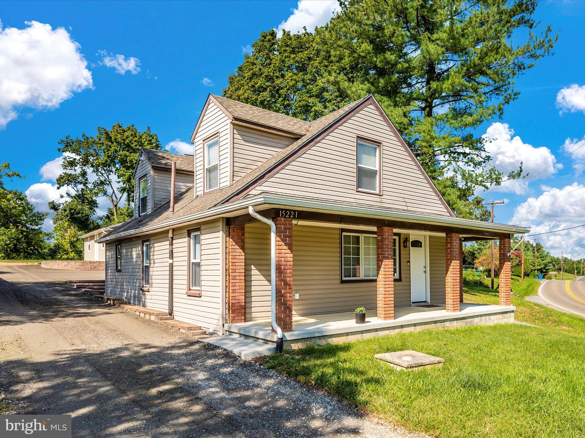 This beautiful home has a wonderful and large kitchen, three bedrooms, a large updated bathroom, living room, pantry and laundry room. So many updates and this house is move-in ready and shows great! The exterior offers so many nice features to enjoy, there's a nice front porch and rear patio, a large private yard, a detached garage, and lots of parking. There's nothing to do in this house but move in. This is a charming home and looks new inside and out!