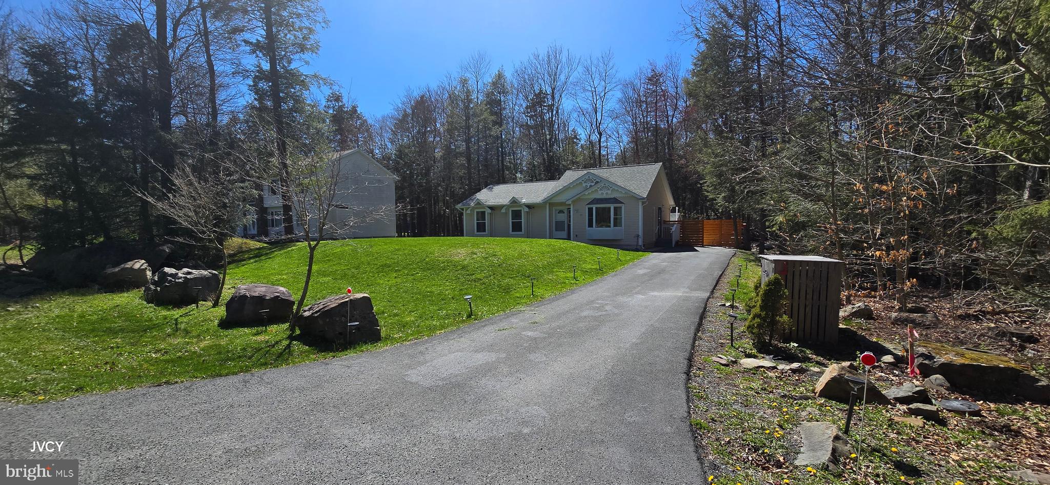 **Turn-Key Ready Pocono Farms Country Club Ranch Home**
Nestled in the vibrant Pocono Farms Country Club community, this beautifully renovated ranch home offers a blend of modern comfort and serene living. With access to a host of amenities, including private beaches, an exclusive golf course, outdoor pools, tennis courts, a fitness center, and much more, you'll enjoy the best of country club living. The home features 3 spacious bedrooms, 2 updated bathrooms, and an eat-in kitchen. The primary bedroom includes an ensuite bath for added privacy and comfort. The home has undergone significant upgrades, including a newer roof (approximately 8 years old), an expanded deck with a privacy wall and garden views, and convenient electric outlets installed around the deck and shed for additional lighting.
This cozy home also boasts 4 mini-splits for heating and cooling, electric baseboard heating, and a charming electric fireplace in the living room. Outdoors, you'll find a propane fire pit and a Blackstone grill, perfect for entertaining. The insulated crawl space ensures a dry, energy-efficient foundation.
Beautifully decorated and move-in ready, this is a must-see home! Furnishings are negotiable based on the offer. Don't miss outschedule a tour today! ''Square Footage is based on Public Records''.