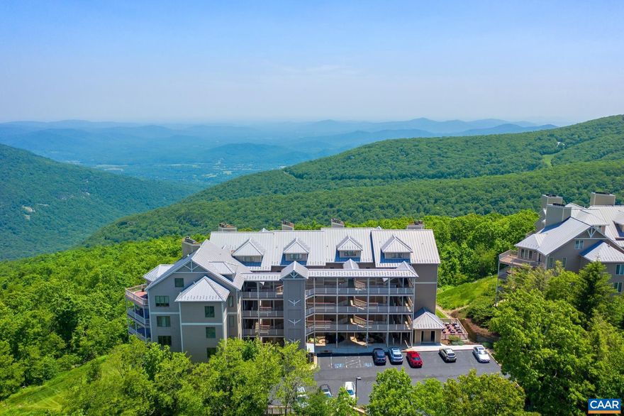 This is one of those rare opportunities to have everything you have been hoping to find! Walk right in with NO STEPS into the most spacious two bedroom condominium Wintergreen has to offer and enjoy spectacular year round views of the Blue Ridge Mountains , Rockfish Valley and winter views of the ski slopes.  This one level floor plan offers carefree living, gracious space for entertaining and oversized wraparound deck for outdoor dining, relaxing and enjoying the views by day and stars by night! Tastefully furnished and upgraded with luxury vinyl floors, lighting and granite in kitchen it?s turnkey ready! High Ridge Place is Wintergreen?s finest and this one is waiting for you!,Granite Counter