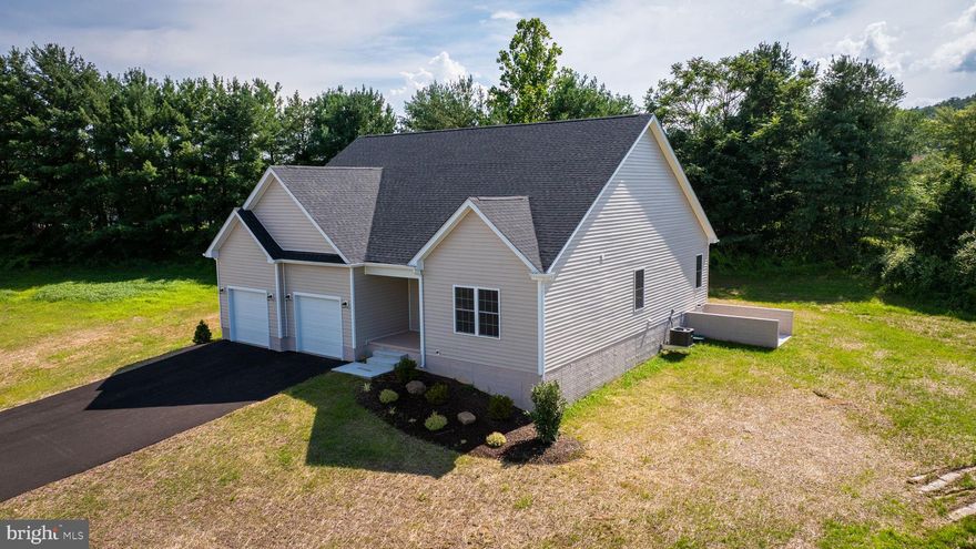 MOTIVATED SELLER*****     Move-in ready new construction in the highly desirable Cacapon South community of Berkeley Springs, WV! 

This stunning ranch-style home showcases beautiful mountain views and perfectly blends modern comfort with timeless craftsmanship, located at the end of a cul-de-sac. Thoughtfully designed with 3 spacious bedrooms, 2 full bathrooms, and a 2-car garage, this home offers an inviting open-concept layout ideal for everyday living and entertaining. Throughout the home, luxury vinyl plank flooring, vaulted ceilings, recessed lighting, and expansive windows create a bright, airy atmosphere filled with natural light. The kitchen highlights, featuring sleek granite countertops, a large center island, soft-close cabinetry, and a spacious pantry. The private primary suite provides a peaceful retreat with a walk-in closet, dual vanities, and a beautifully tiled walk-in shower. On the opposite side, two additional bedrooms and a full bath offer comfort and flexibility for family, guests, or a home office. The full walkout basement with rough-in plumbing is ready for your creative touch—perfect for future expansion, a recreation room, or an in-law suite. Enjoy the serene, tree-lined backyard, elegant wainscoting details, a paved driveway, and quality finishes throughout. Conveniently located just across from Cacapon Resort State Park, where hiking, golfing, fishing, and endless outdoor recreation await. Seller is highly motivated and ready to make a deal just in time for the holidays—don’t miss this opportunity to make this beautiful home yours!
