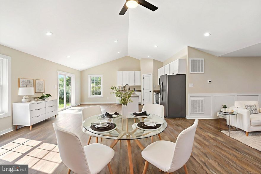 Welcome home to this beautifully crafted new construction ranch in the sought-after Cacapon South community of Berkeley Springs, WV. Perfectly positioned at the end of a quiet cul-de-sac, this home offers peaceful mountain views and a seamless blend of modern style and timeless design.
Inside, you’ll find 3 spacious bedrooms, 2 full bathrooms, and a 2-car garage, thoughtfully laid out in an open-concept floor plan ideal for both everyday living and entertaining. Vaulted ceilings, luxury vinyl plank flooring, recessed lighting, and oversized windows fill the home with natural light and an airy feel throughout.
The kitchen is a true focal point, featuring granite countertops, a large center island, soft-close cabinetry, and a generous pantry—perfect for gatherings and daily functionality. The private primary suite offers a relaxing retreat with a walk-in closet, dual vanities, and a beautifully tiled walk-in shower. Two additional bedrooms and a full bath provide flexible space for guests, a home office. 
Downstairs, the full walkout basement with rough-in plumbing offers endless potential for future living space, recreation, or an in-law suite. Outside, enjoy a paved driveway, elegant wainscoting details, quality finishes, and a serene, tree-lined backyard.
Located directly across from Cacapon Resort State Park, you’ll have easy access to hiking, golf, fishing, and year-round outdoor recreation.
 Seller is highly motivated — a fantastic opportunity to own a move-in ready home in one of Berkeley Springs’ most desirable communities. Schedule your showing today!