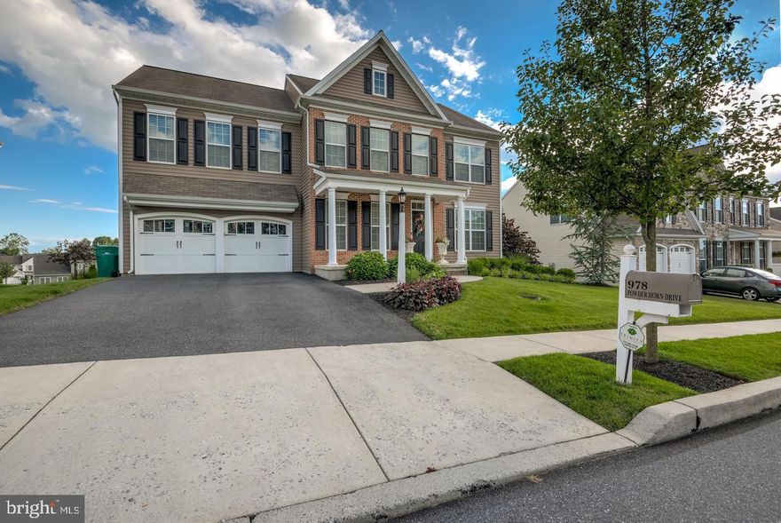 Move right into this stunning home located in the coveted Southpoint Meadows II and Derry Township School District. Inside, the family room features bright natural light, a gas fireplace, and custom-built-ins. The open kitchen boasts granite countertops, a large island/breakfast bar, stainless steel appliances, and a butler’s pantry. The formal dining room, den/office, and convenient main floor laundry complete the first level. Upstairs, the master suite offers a spacious walk-in closet and an attached full bath with a walk-in shower and soaking tub. Three additional bedrooms, a full bath, and a loft provide versatile living space. The finished lower level includes a fifth bedroom, full bath, hobby room, game room, and ample storage space. Step outside to enjoy peaceful mornings on the covered porch or host summer gatherings on the covered deck & paver patio. This exceptional home truly has it all, offering the perfect blend of comfort, style, and space for every stage of life.