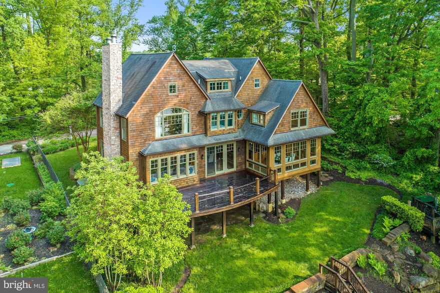 CUSTOM WATERFRONT W/ DEEP WATER!Open floor plan w/ maple wood flrs, recessed lighting, gas fp & gourmet kitchen-6 burner gas WOLF range,Sub-Zero fridge, ASKO DW & Icemaker.Master suite w/ gas fireplace,spa like master bath w/ steam shower w/ dual shower head & body jets & BainUltra tub.Whole house generator.Irrigation system.Tram to private sandy beach & dock w/ 2 slips,boat lift, water & electric