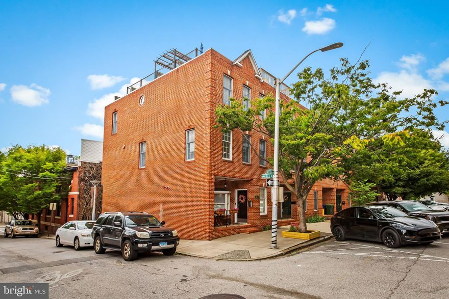 Welcome to your 3 story 20 foot EOG brick townhome with a 2 Car Garage!! This beautiful home has been meticulously renovated!!. The owners left nothing untouched starting with the gourmet kitchen. It features a gas 5 burner cooktop, large island with seating for 3, quartz counters and custom cabinets.  All the walls were removed on the 2nd level which makes for an open floor plan allowing ample room to have a dining area and comfortable family room. The 3rd floor features 2 bedrooms, each with their own remodeled baths and walk-in-closets. There is an incredible low maintenance roof deck with city and water views! House has been well maintained and has had many updates recently starting with the  HVAC, recessed lights, tankless hot water system. heated floors in both baths and bonus room, custom murphy bed, hardwood through-out, window treatments and so much more.  Community Amenities: Explore all that Baltimore has to offer. Less than a 10-minute walk to both lively Canton Square and the historic neighborhood of Fells Point with its recently remodeled Broadway Market. Meander through bucolic Patterson Park and stroll along the Inner Harbor Promenade, each 1 1/2 short blocks away. Entertainment, shopping and dining await at the Shops at Canton Crossing, Harbor East, Little Italy and downtown Baltimore. Convenient to Johns Hopkins Medical Center and the major businesses in Harbor East. Major commuter routes are I-95; I-83 and I-695. This home does not disappoint!!