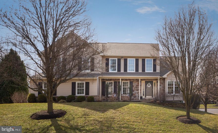 The appeal of this home in the desirable Unionville-Chadds Ford School District is apparent—from its gracious curb appeal to the deck off the kitchen with a patio and fire pit, perfect for enjoying outdoor summer nights. With lovely touches, including vaulted ceilings and hardwood floors throughout, as well as numerous upgrades, this West Chester home is special indeed. The center foyer greets the visitor, leading to the living room and dining room, with hardwood floors throughout the first floor. The living room has a wonderful vaulted ceiling and large windows for plenty of sunshine. The dining room off the kitchen, currently used as a bar area, has crown moldings and a sliding door to the outside deck. There is also an office with large windows to the left of the entrance. The comfortable and pretty family room, also with vaulted ceiling, is perfect for relaxing evenings at home. With a wood-burning fireplace that can be converted to gas, a skylight, ceiling fan and windows with shutters that let in plenty of sunshine, this home is perfect throughout the seasons. The family room opens to the kitchen, with its attractive granite countertops, stainless steel appliances, a center island with seating, and a pretty breakfast area. A door leads to the outside deck from the breakfast area, overlooking the yard. A powder room and laundry room with access to the attached garage finish out the first level. On the second level, a recently carpeted hallway leads to the four bedrooms. In the main bedroom, plentiful windows let in light, and the room has two walk-in closets, each of which have California Closet organizers. The en-suite bath, renovated in 2021, is lovely, with a sleek walk-in shower and two-sink vanity with plentiful drawers. Each of the remaining three bedrooms is appealing, with ceiling fans and California Closet organizers. The hall bath, redone in 2019, features a tub/shower combination, two pedestal sinks, and bead board. The finished lower level has room for exercise or hobbies and is a walk-out to the outside. Roof new in 2022. The home also has a two-car attached garage. Nature lovers will enjoy easy access to Sandy Hollow Heritage Park with its scenic walking trails. Just a short drive to the borough of West Chester, you will enjoy all its amenities, including shopping and dining. There is also easy, convenient access to Routes 1 and 322.