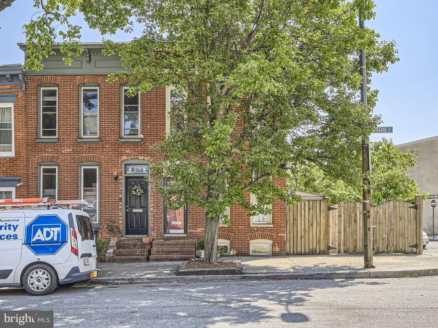 Maryland's local brokerage proudly presents 821 W Barre St! Updated and impeccably maintained end of group with HUGE side yard just three blocks from Camden Yards! Open floor plan is perfect for entertaining. With spacious living and dining areas, hardwood floors throughout, recently renovated bathrooms and exposed brick, this end unit a truly unique charmer. Especially wide living room leads to an open kitchen complete with new countertops, large farm sink and dining area with half bath on the main level. Rear entry to your private fenced garden oasis opens to an expansive yard that is ideal for grilling and watching the sunset from the pergola. Want to play yard games with friends or looking for a place to store your mower? The outdoor weatherproof shed has the space for that. Large bedrooms contain custom California closets and hardwood floors. Windows on three sides plus three across the front of the house allow for ample natural light throughout the day in all rooms. Excellent location with easy access to major highways and within walking distance of stadiums, downtown attractions, and UM medical campus. Situated on a quiet, tree lined street and eligible for Live Near Your Work and other Buying into Baltimore grant incentives!