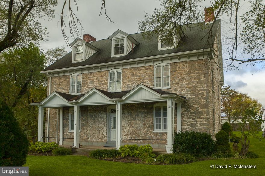 A rare find! A circa 1753 gracious,4897 SF,ALL STONE MANOR HOME, ON THE MAIN ROAD FROM WINCHESTER TO  MARTINSBURG, Features include;  A LARGE IN-GROUND OLYMPIC SIZE SWIMMING POOL,  A SEPARATE GUEST COTTAGE, A BURBLING STREAM ALONG THE PROPERTY LINE OF THE 2.12 ACRE LOT. Features include hardwood floors, crown molding, 6' windows. The living room and dining room have  stone fireplaces.  AN EXCEPTIONALLY LARGE  THIRD FLOOR HAS BEEN CONVERTED INTO A GREAT MASTER SUITE with sitting area.  THE 5 BR, 4 BA HOME HAS FULLY MODERN UPGRADES AND HAS BEEN EXCEPTIONALLY WELL MAINTAINED. There is a separate guest house with hardwood floor, kitchenette, full bath and attic bedroom that could be used as an mother-in law  office, rental or Commercial possibilities for Air B&B, Tavern, store or more.  Very attractive setting bordered by Mill Creek with a large side yard, and mature trees.  Well landscaped. MOVE IN READY. This home was originally known as "STEPHENSON'S TAVERN at MILL CREEK. "If the walls could talk"; "throughout the years since it was build, the discussions that have been held over such topics as the death of General George Washington, the War of 1812, the Civil War, Great Depression and more".  Stephenson Tavern is listed on the National Register of Historic Places, and was one of the first places in Berkeley County where public school sessions were held.  It is within the historic area designated as Bunker Hill, and we hope the new owners will find a way to share the place with the spirits of the thousands of travelers from previous eras.