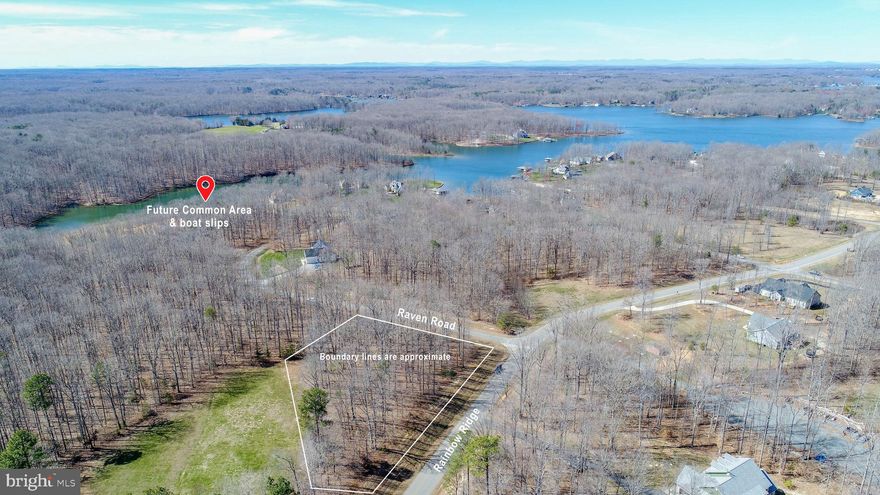 BEST OF TWO WORLDS with this 1-acre corner lot in the desirable Noah's Landing Community on the PRIVATE side of Lake Anna.  This lot offers privacy as it backs to community property which will not be built upon.  And provides the option of connecting to the Community Mass Drain Field with HOA approval, which saves thousands, or you have the option of installing a traditional septic system.  The property has already been surveyed and soil tested.  BOAT SLIP #29 is a 22' slip in the newer slips and is deeded to the lot.  The location of the lot offers privacy and quiet and is just a short distance to the community amenities and boat slips.