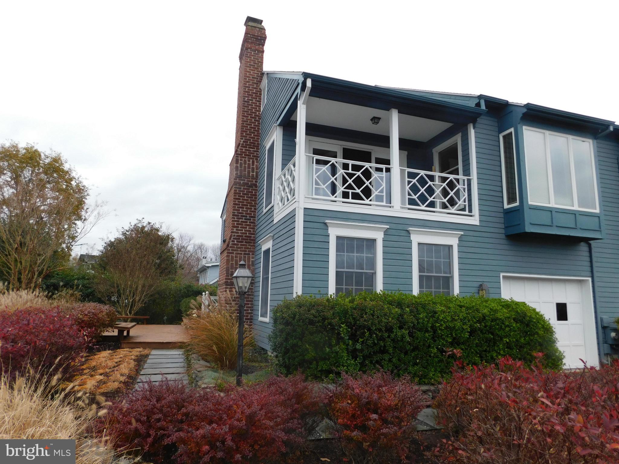 Oxford Townhome with deeded boat slip. Some water view. Nice deck, second floor balcony. Fireplace. Wide plank wood floors.Cathedral ceilings and open floor plan.