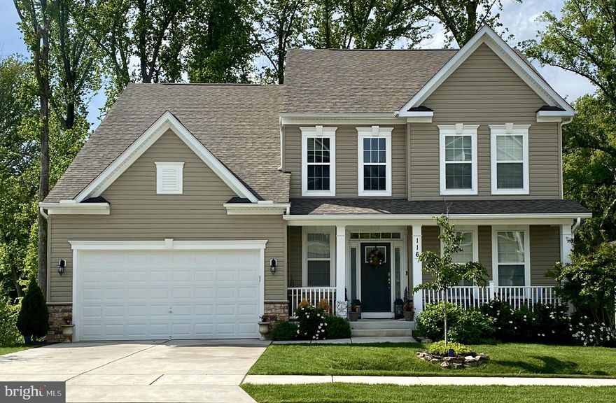 Welcome home to the community of Arnold Overlook on the Broadneck Peninsula. This wonderful community is perfectly situated between Annapolis and Severna Park and just minutes to major commuter routes, the naval academy, shopping, dining, and nearby top-rated schools. This beautiful move in ready home will check ALL of the boxes on your wish list! With almost 5,000 square feet this 2019 built, move in ready home provides plenty of natural light and space for family, and entertaining friends! 
The light filled two-story entry welcomes you into the open floor plan with nine-foot ceilings and gorgeous hardwood floors.
You will be immediately drawn to the eat in kitchen sunroom area at the rear of the home surrounded by windows and a sliding door which leads you out to the large elevated 16x26 composite deck with cable railing. The large deck overlooks a wooded preserve area and is truly a bird watchers paradise! 
If you have ever dreamt of living in a tree house now is your chance! The main floor also offers a dedicated office space at the entry with French doors providing the ideal work from home scenario, a formal dining space, a gourmet kitchen with stainless steel appliances and quartz countertops, and a large open concept family room with gas fireplace. The first floor is complete with a guest bedroom and full bath. 
The second floor includes the primary bedroom with large ensuite bathroom and three additional bedrooms and full bathroom. The finished lower level includes large windows and a door with ground level walk out. This level offers a multitude of possibilities with plenty of space for a sitting area, pool or air hockey table, space for a game or poker table, and an exercise space. The lower level also includes a sixth bedroom and a full bathroom, which provides the ideal area for an additional guest bedroom or hobby room. A large unfinished storage room and utility room complete the lower level.
This conveniently located modern home with beautiful finishes is truly a rare find in this area!