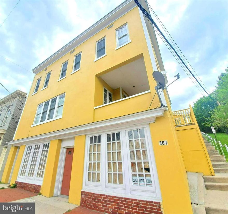 AMAZING INVESTMENT OPPORTUNITY!!!  LOCATED IN DOWNTOWN CUMBERLAND, THIS 4 UNIT APARTMENT BUILDING W/ POTENTIAL COMMERCIAL SPACE ON LOWER LEVEL IS A MUST SEE! 
ALL APARTMENTS ARE RENTED!  RENTS ARE $600, $500, $650 AND $500 PER MONTH.  TENANTS PAY ELECTRIC AND GAS. OWNER PAYS AN AVERAGE OF $250.00 PER MONTH FOR WATER.   CENTRAL AIR! 
CLOSE PROXIMITY TO DOWNTOWN, RESTAURANTS, AND HOSPITAL.  MAIN LEVEL HAS POTENTIAL TO MAKE A GREAT COMMERCIAL SPACE BUT IS CURRENTLY USED FOR STORAGE.  CALL TODAY TO  SCHEDULE A TOUR!