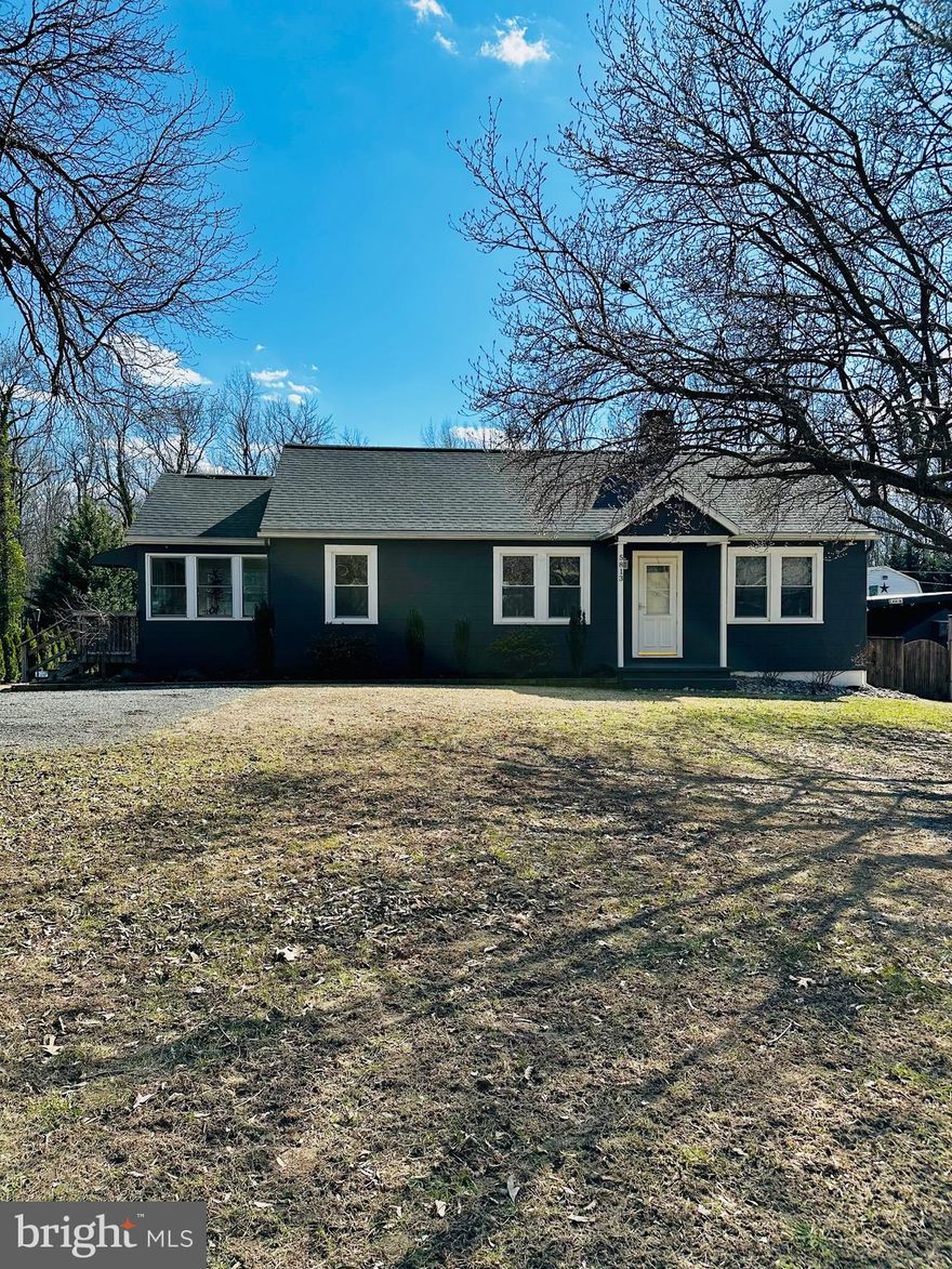Welcome home to your own private tiki oasis. This distinctive property is situated on nearly an acre of land. The main residence features three bedrooms and two full bathrooms. The upper level encompasses a combined living room and dining room, a kitchen, and a sunroom with ample natural light. Two bedrooms and a full bathroom are also located on this level. The lower level boasts a spacious family room, the third bedroom, and an additional full bathroom. A separate, smaller cottage house, ideal for use as an investment property or in-law suite, features one bedroom, a full bathroom, a family room, a kitchen, and a dining area. Both properties are conveyed under a single deed. The outdoor space boasts a multi-level deck leading to an exterior bar, known as Snapper Cove. Additional features include a well-maintained hot tub and an above-ground pool with a new pump.  A separate fenced off area with an oversized dog house for your family pet.  A storage container and a large shed, suitable for use as a garage, are also present. A carport provides protection from the elements, and ample parking is available, including space for work trucks.  Newer roof on both houses and carport. This beautifully maintained property presents a unique opportunity that should not be missed.