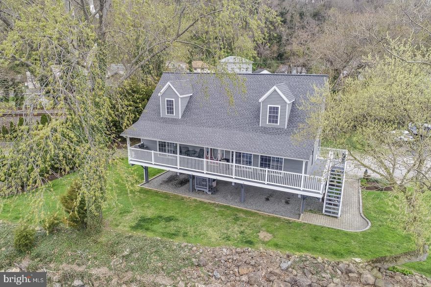 Waterfront home on the Susquehanna River with unobstructed views from virtually every room. Just a short walk from downtown Port Deposit and Tome's Landing Marina. Enjoy the local waterfront restaurants, marina, museums and the park. Open floor plan provides a light and airy atmosphere backdropped by views of the Susquehanna River. Two-story Family Room features dual sliders that lead to a wrap-around porch overlooking the river. Main level bedroom with walk-in closet and private entrance to porch, additional bedroom on second floor plus loft/bonus room that could be used for a third bedroom. Enjoy the amazing sunsets and wildlife that this unique waterfront home has to offer. Better yet, this home is just minutes from the commuting corridors for Baltimore, Washington and Philadelphia. Chesapeake Bay living for under 500k!