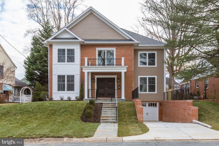 Stylish and captivating semi modern/transitional spacious home. Step into the exquisite open two level majestic foyer. Enjoy brick front with wood bay window and hardy plank sidings. Modern kitchen with impressive design, cabinets and appliances. Coffer ceilings to render and enhance elegance. Lots of windows for sunlight. Custom made bathroom vanities and stone veneer fireplace. Distinctive Master bathroom boasts select travertine natural stone layout; glass shower and double vanity. Impressive double front door with advanced security features. Front porch with flagstone steps adorns a flare of taste. Flagstone rear patio to entertain guests or to just sit out in the pleasant summer evenings. Walk out basement through garage. Spacious In-law/au pair suite in the basement with walk-in closet, attached bathroom with beautiful glass shower. Large entertainment room in the basement. Lots of storage and closet space in this house. Two Carrier AC units for customized climate control. Six feet wooden perimeter fence for privacy. Great accessibility. Minutes from I-495 and I-270. Great school district. Schedule your home visit online.