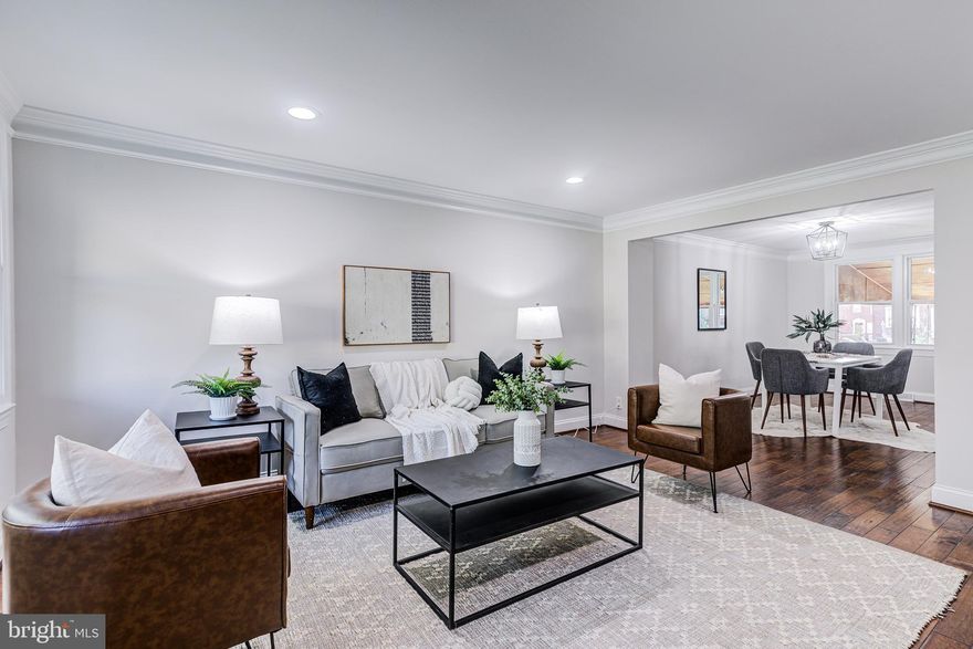 Come tour this beautiful interior rowhome in the desirable Cedonia neighborhood of 21206! This home was previously remodeled and refreshed with fresh paint, new carpet, updated appliances, new roof seal, and so much more! The main level is wide open with  engineered hardwood floors throughout, crown molding, recessed lighting, and a kitchen perfect for cooking and entertaining out of! The upstairs features 3 spacious bedrooms and 1 full bathroom that will surely impress with beautiful tile work and a soaking tub / shower! The basement is fully finished with recessed lighting and a 2nd full bathroom. The basement could be used as either a 4th bedroom, additional living room, or game room! Walk out access from both the basement and the kitchen area lead to your covered rear patio and 1 car parking pad! This home has it all and is ready for your buyers! Show it today before it's too late!